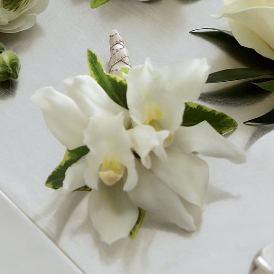 White Mini Cymbidium Boutonniere –  Deeshay Custom Design, Goldsboro NC